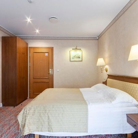Story Inn Self Check-In Hotel Vilnius Bagian luar foto